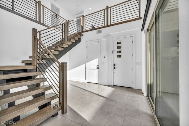 entrance foyer featuring a high ceiling