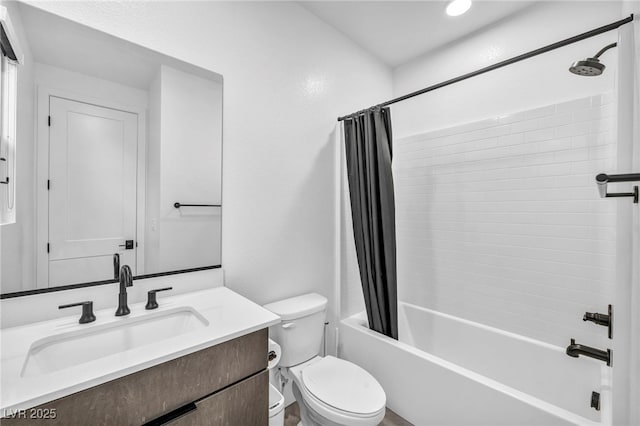 full bathroom with vanity, toilet, and shower / bath combo with shower curtain