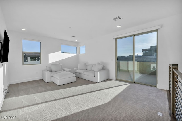 living room with light colored carpet