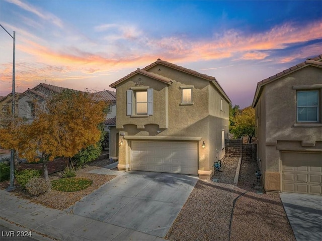 view of front of home with a garage