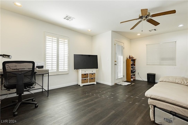 interior space with dark hardwood / wood-style floors and ceiling fan