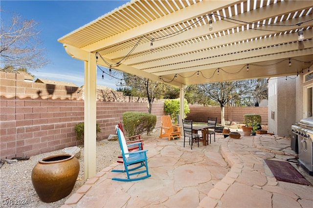 view of patio / terrace featuring a pergola