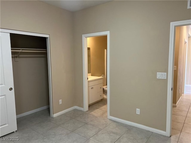 unfurnished bedroom featuring a closet, visible vents, baseboards, and light tile patterned flooring