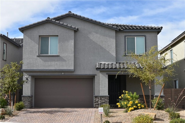 view of front of home with a garage