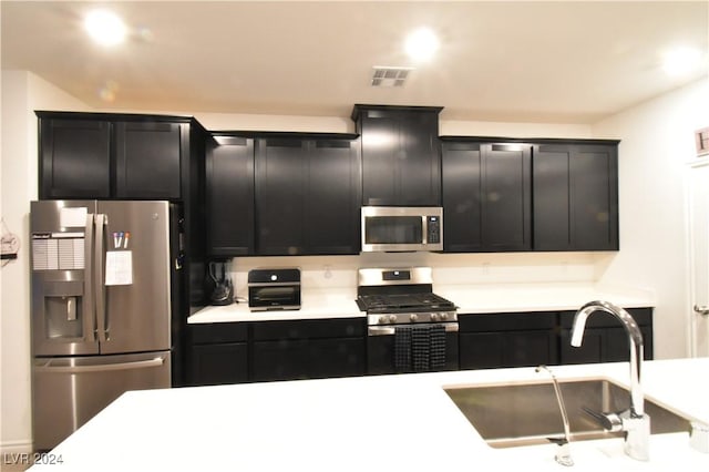 kitchen with sink and stainless steel appliances