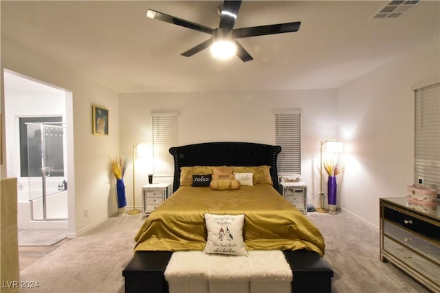 bedroom with ceiling fan and light carpet