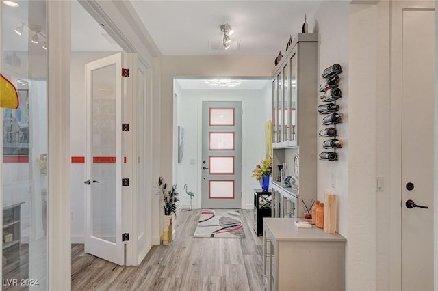 foyer featuring light wood-type flooring