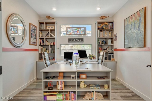 home office featuring light hardwood / wood-style flooring