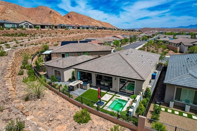 drone / aerial view featuring a mountain view