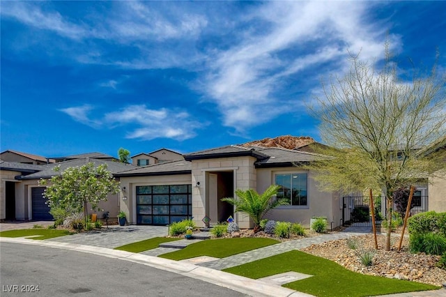 view of front of property with a garage