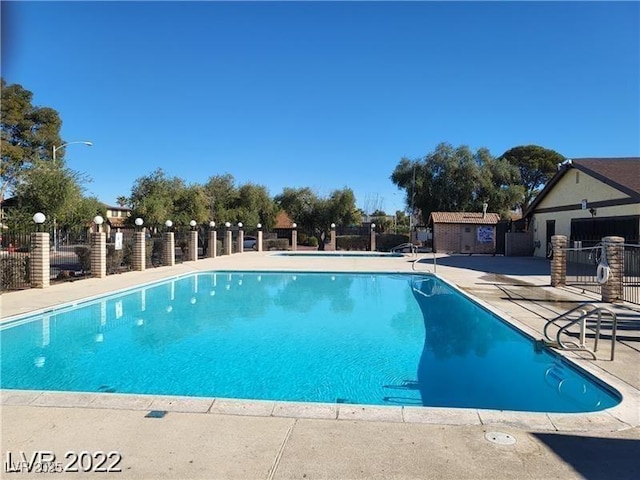 view of pool featuring a patio area