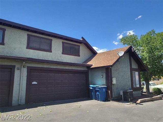 view of front of property with central AC