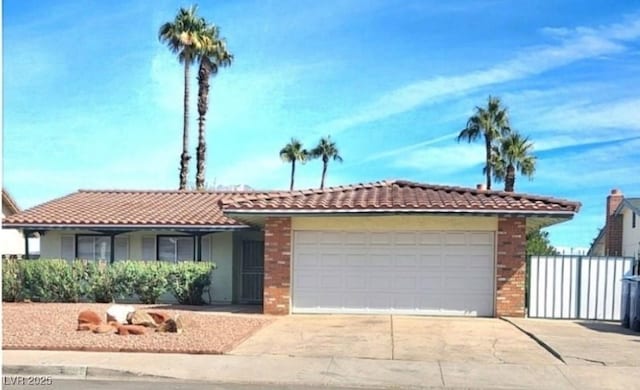 single story home featuring a garage