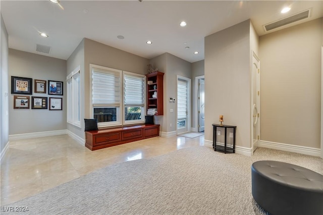 interior space with recessed lighting, visible vents, and baseboards