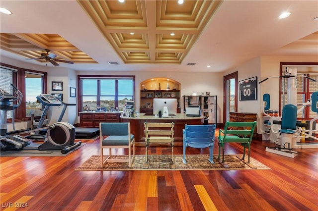 interior space with coffered ceiling, ceiling fan, and wood-type flooring