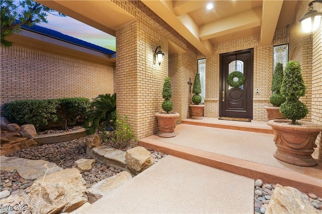 exterior entry at dusk with a porch