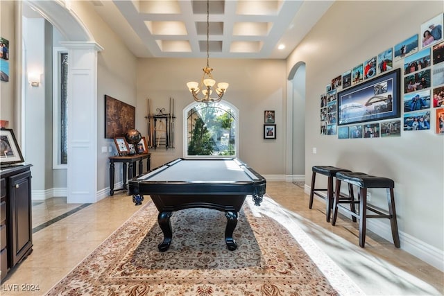 rec room with coffered ceiling, decorative columns, pool table, a high ceiling, and beam ceiling