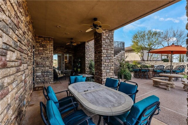 view of patio / terrace featuring ceiling fan and an outdoor hangout area