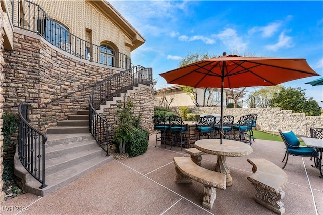 view of patio / terrace featuring a balcony