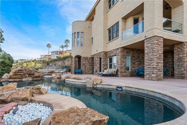 view of pool with a patio