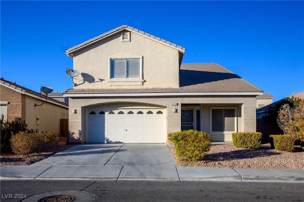 view of property featuring a garage