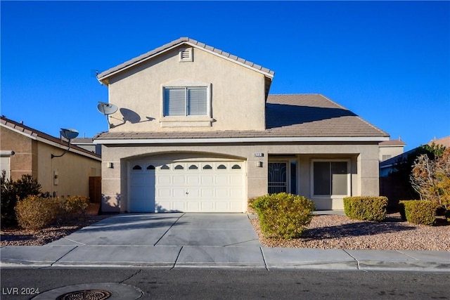 view of property featuring a garage