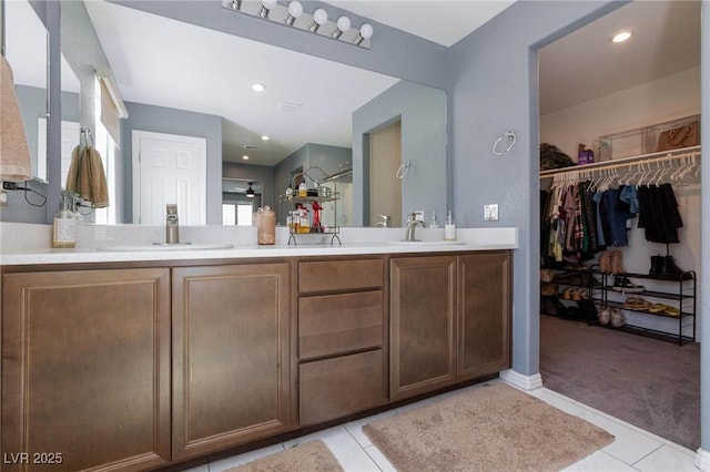 bathroom with vanity and tile patterned floors