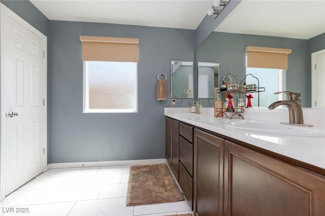 bathroom featuring tile patterned floors and vanity