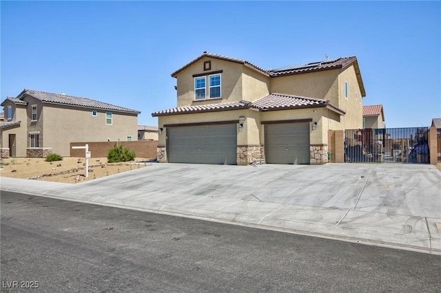 mediterranean / spanish-style house featuring a garage