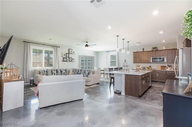 living room with ceiling fan