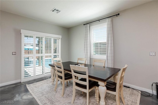 dining space featuring a wealth of natural light