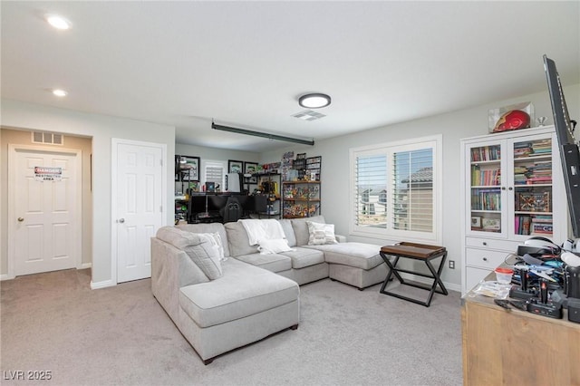 living room featuring light carpet