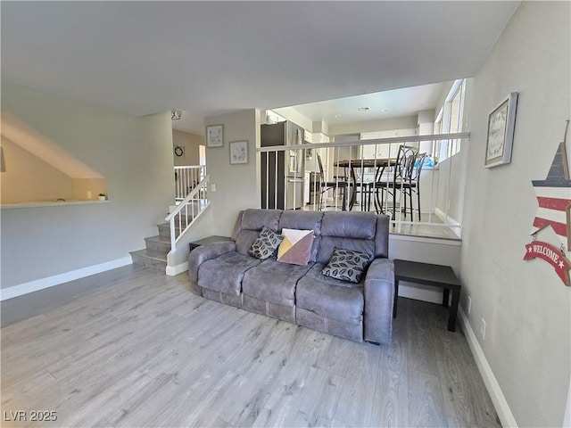 living room with light hardwood / wood-style floors