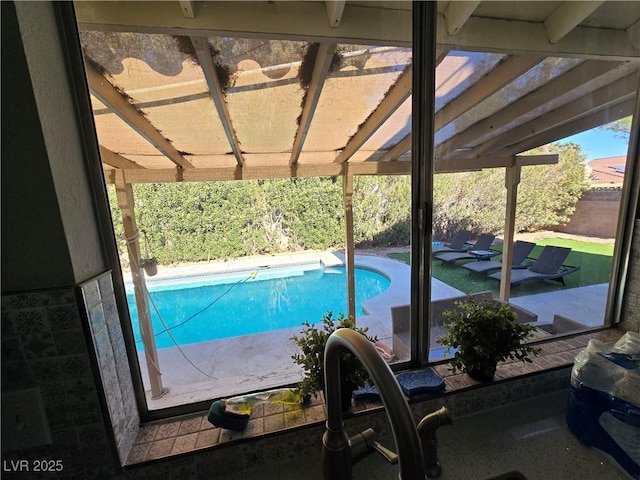 view of pool with sink and a pergola