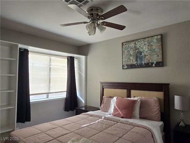 bedroom featuring ceiling fan