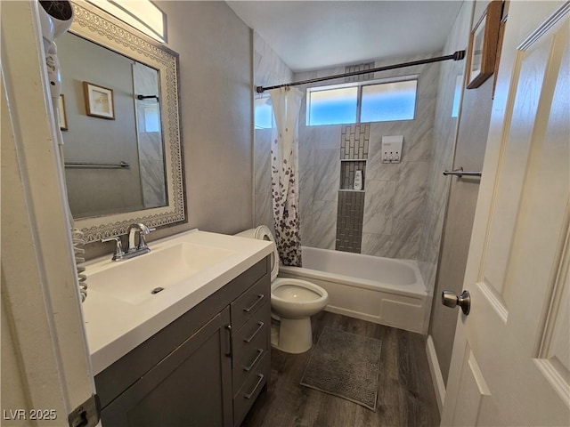 full bathroom with toilet, shower / tub combo, vanity, and hardwood / wood-style floors