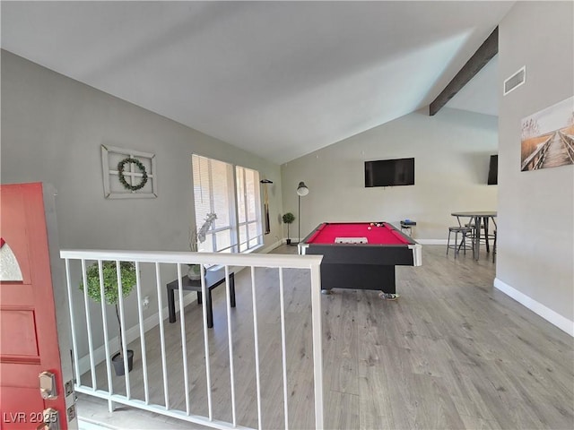 game room featuring wood-type flooring, pool table, and lofted ceiling with beams