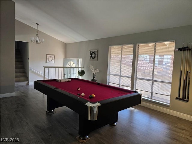 recreation room with a wealth of natural light, a notable chandelier, dark hardwood / wood-style flooring, and pool table