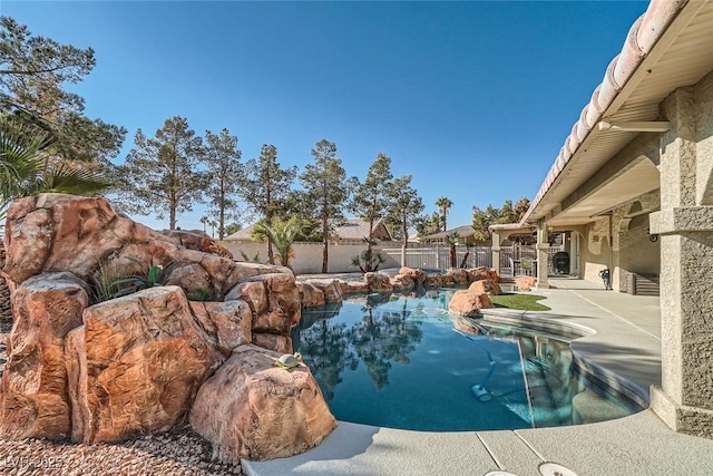 view of swimming pool featuring a patio