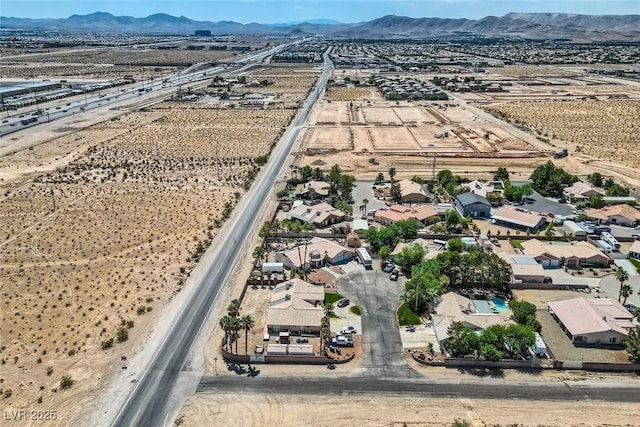 aerial view featuring a mountain view