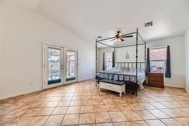 tiled bedroom featuring vaulted ceiling, access to outside, ceiling fan, and french doors