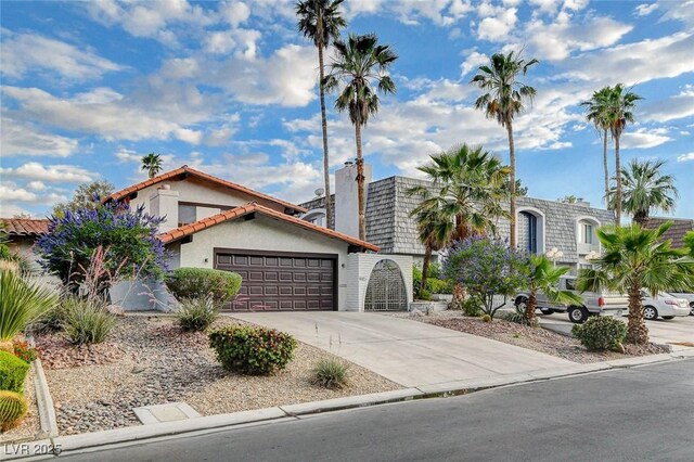 view of front of property with a garage