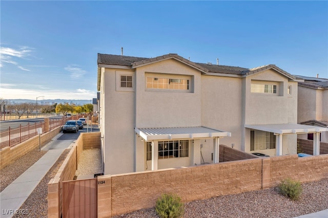 view of front of property with a mountain view