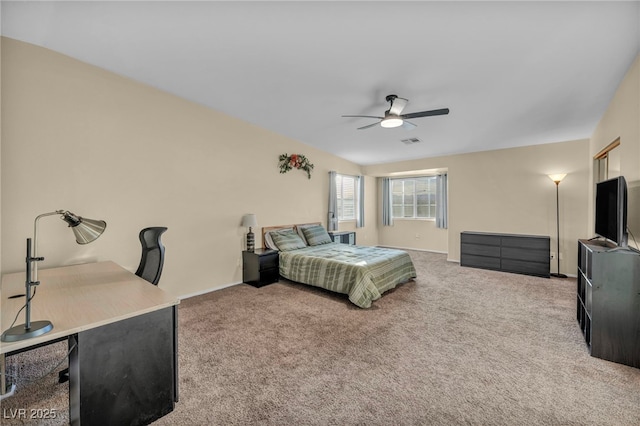 carpeted bedroom with ceiling fan