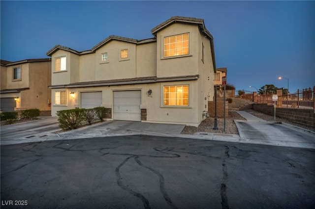 view of front of property featuring a garage