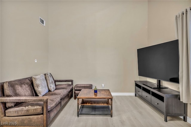 living room with light wood-type flooring