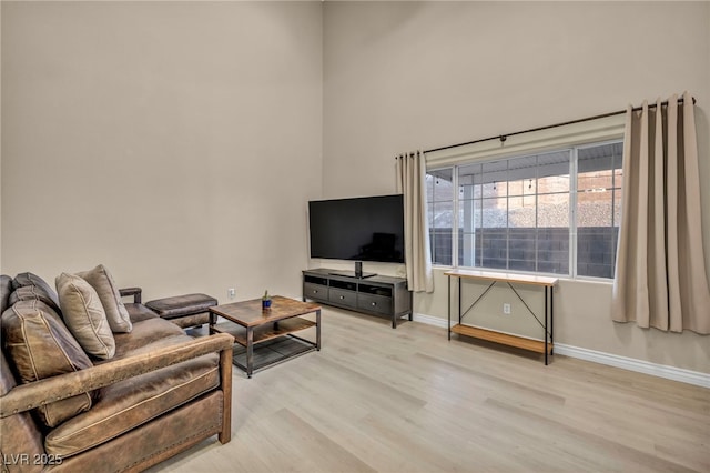 living room with light hardwood / wood-style floors