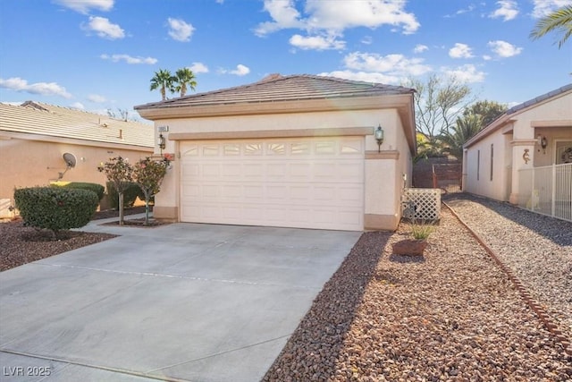 view of side of property with a garage