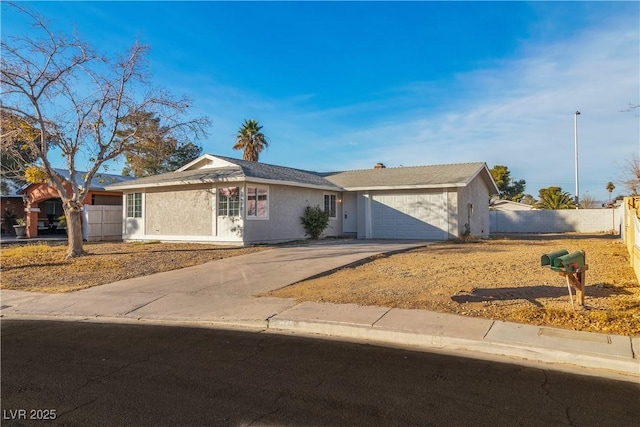 single story home featuring a garage