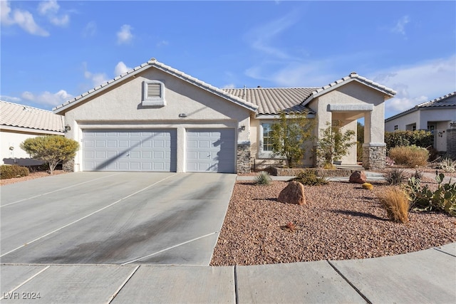 view of front of home featuring a garage